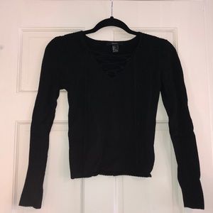 Black sweater with criss cross v neck